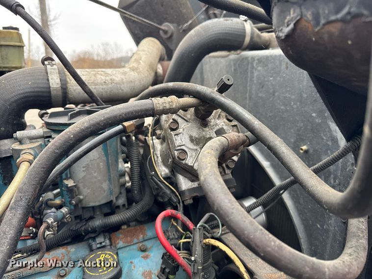 image for item DH9796 1995 International 4700 hook lift truck