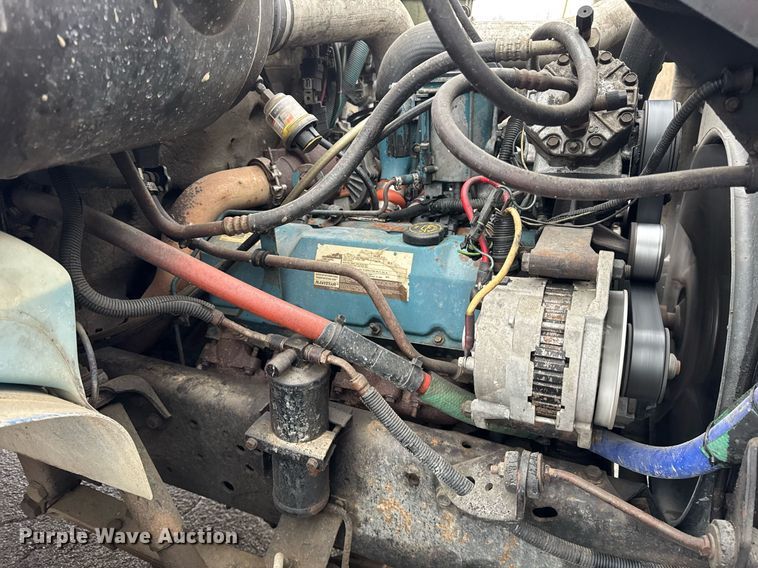 image for item DH9796 1995 International 4700 hook lift truck