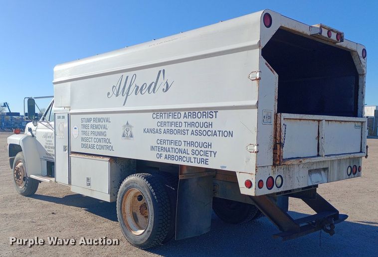 image for item DK7441 1994 Ford  F700 chipper truck