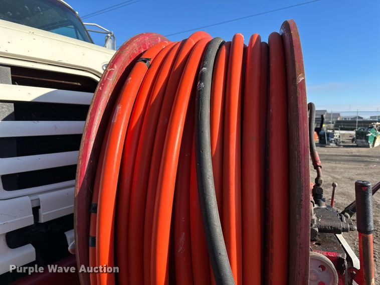 image for item EN2561 1997 Ford Louisville  sewer jetter truck