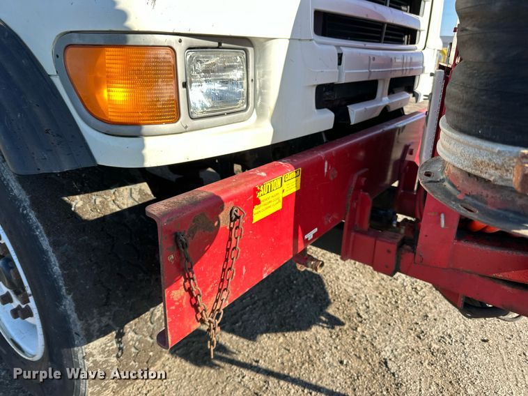 image for item EN2561 1997 Ford Louisville  sewer jetter truck