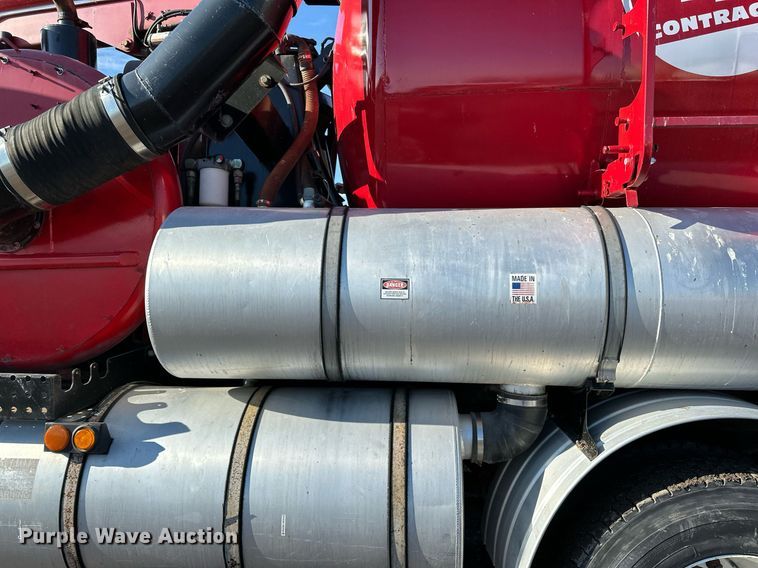 image for item EN2561 1997 Ford Louisville  sewer jetter truck