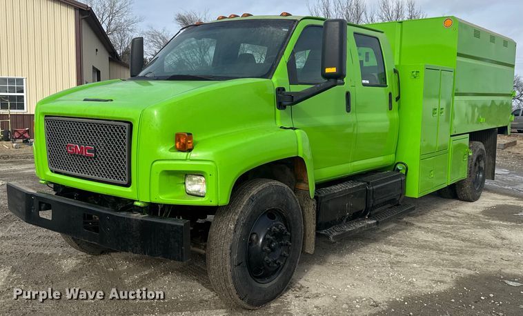image for item LH9461 2009 GMC C6500 Crew Cab chipper truck