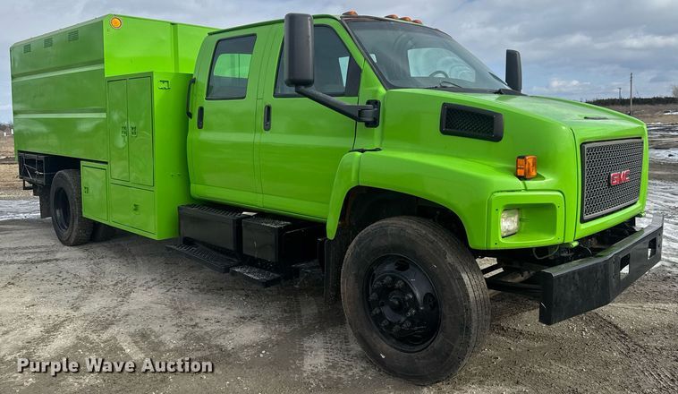 image for item LH9461 2009 GMC C6500 Crew Cab chipper truck