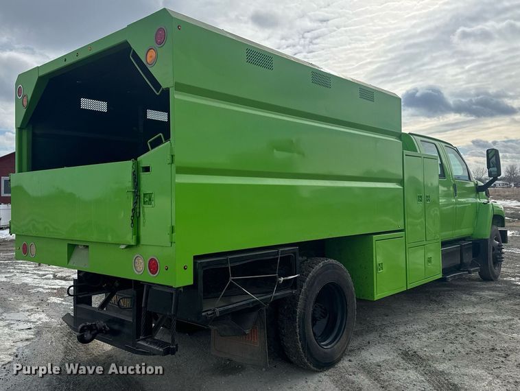 image for item LH9461 2009 GMC C6500 Crew Cab chipper truck