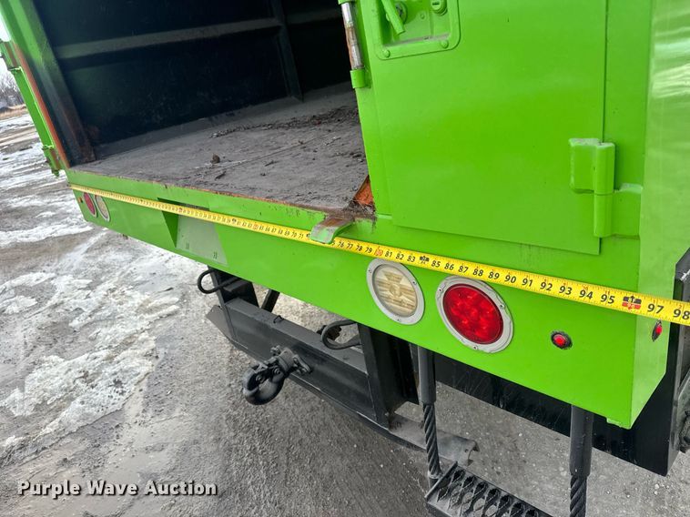 image for item LH9461 2009 GMC C6500 Crew Cab chipper truck