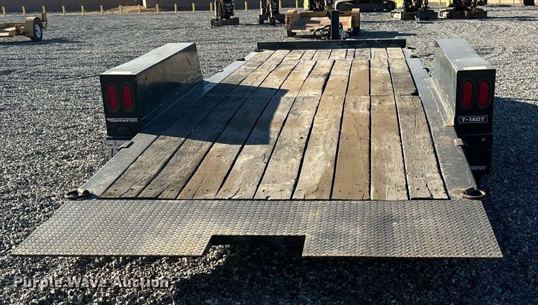 image for item YA0252 2020 Monroe Towmaster Tilt deck utility trailer