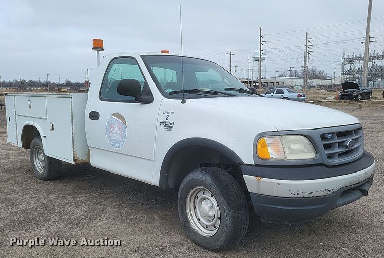 image for item DS5235 2000 Ford F150 utility bed pickup truck