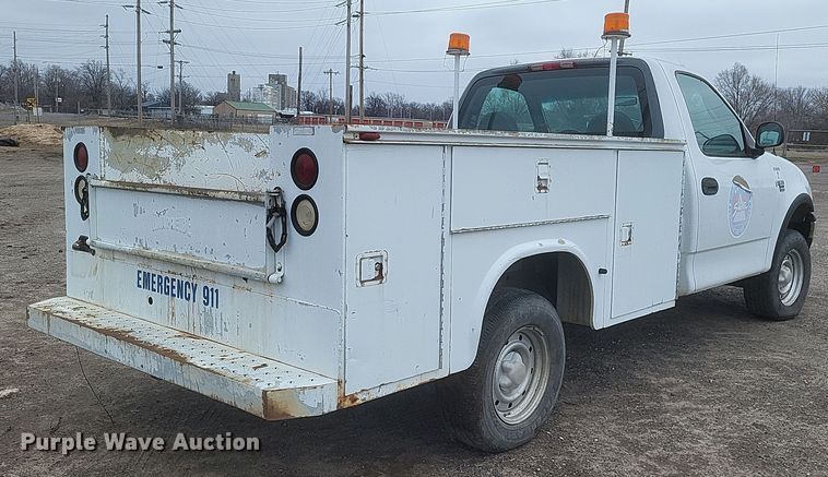 image for item DS5235 2000 Ford F150 utility bed pickup truck