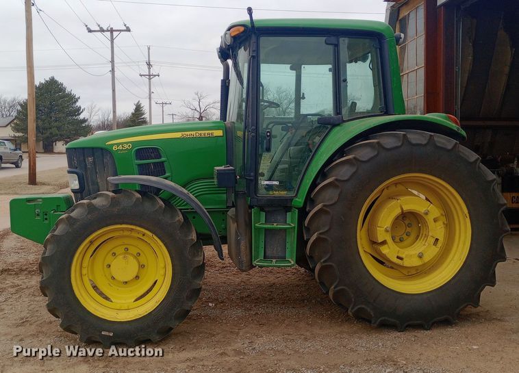 image for item EO0586 2010 John Deere 6430 MFWD tractor