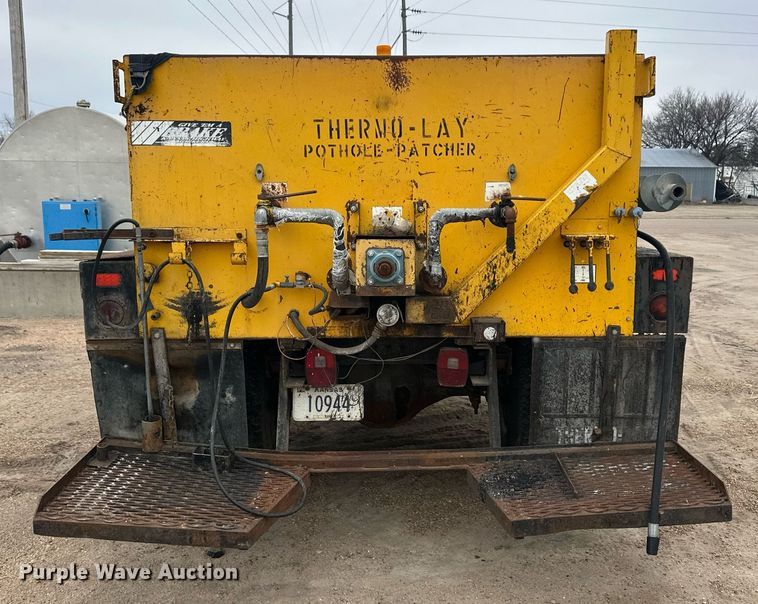 image for item ER8711 1982 Ford 700 oil distributor truck