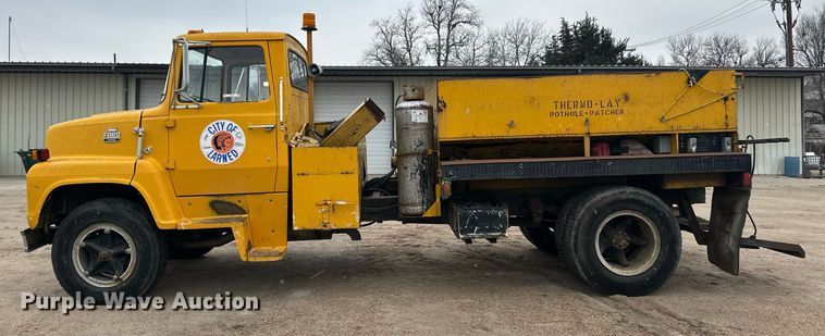 image for item ER8711 1982 Ford 700 oil distributor truck