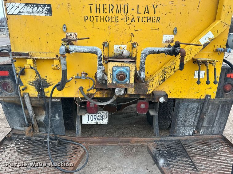 image for item ER8711 1982 Ford 700 oil distributor truck