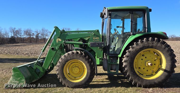 image for item DH9793 2002 John Deere 6420 MFWD tractor