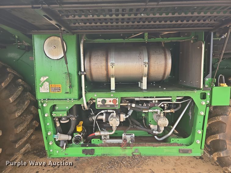 image for item YA0315 2019 John Deere CP690 cotton picker