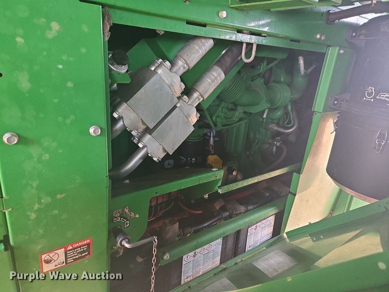 image for item YA0315 2019 John Deere CP690 cotton picker
