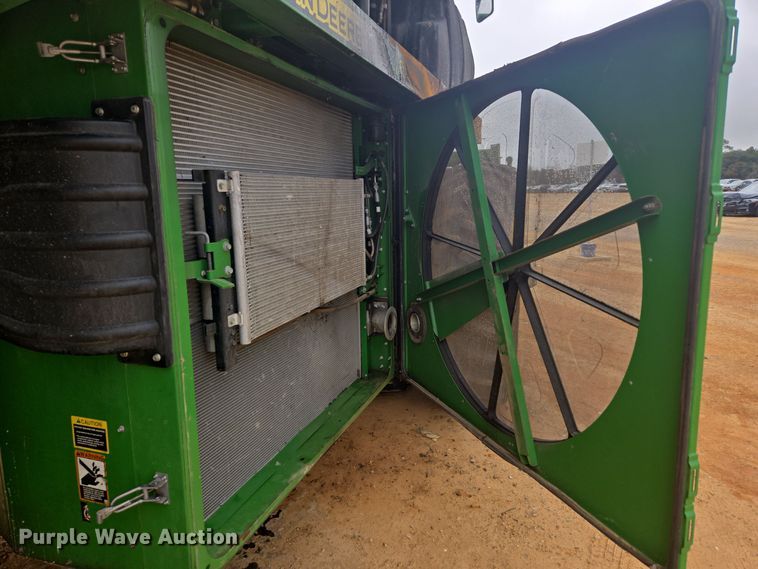 image for item YA0315 2019 John Deere CP690 cotton picker