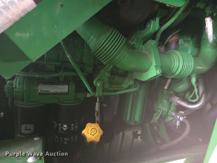 image for item YA0315 2019 John Deere CP690 cotton picker