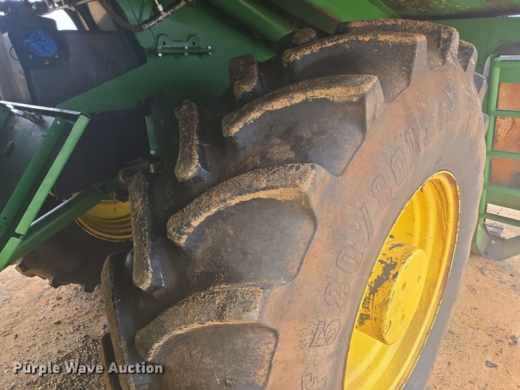 image for item YA0315 2019 John Deere CP690 cotton picker