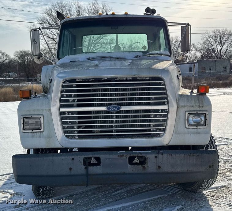 image for item DT0555 1990 Ford L9000 hook lift truck