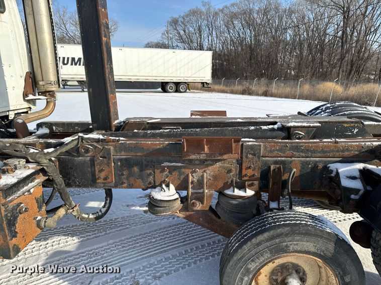 image for item DT0555 1990 Ford L9000 hook lift truck