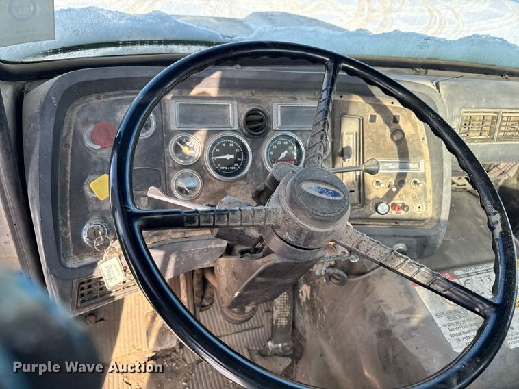 image for item DT0555 1990 Ford L9000 hook lift truck