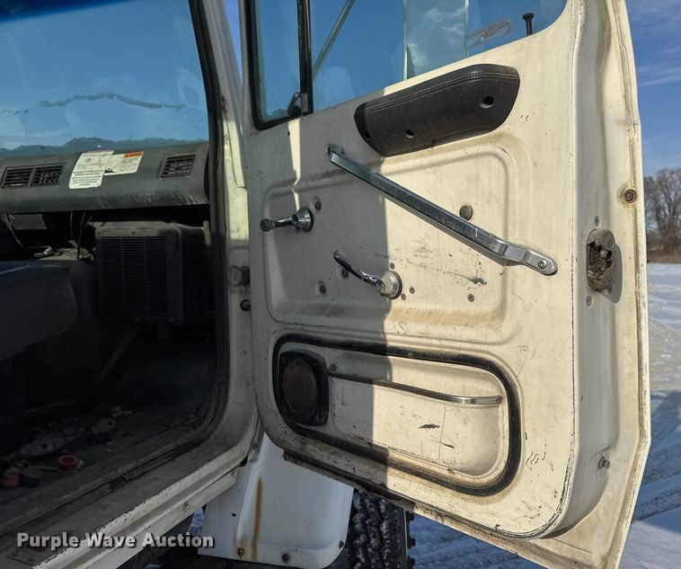 image for item DT0555 1990 Ford L9000 hook lift truck