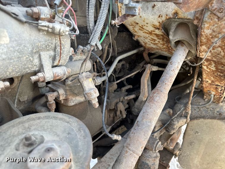 image for item DT0555 1990 Ford L9000 hook lift truck