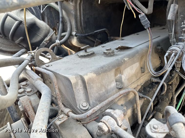 image for item DT0555 1990 Ford L9000 hook lift truck