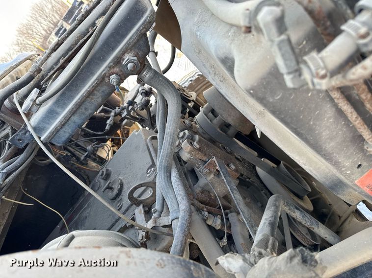 image for item DT0555 1990 Ford L9000 hook lift truck