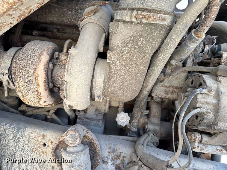 image for item DT0555 1990 Ford L9000 hook lift truck