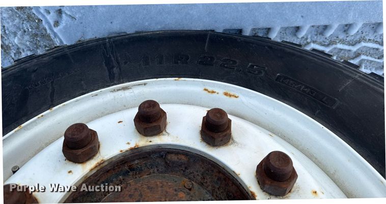 image for item DT0555 1990 Ford L9000 hook lift truck