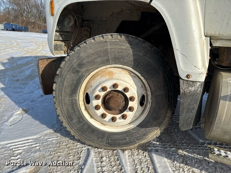image for item DT0555 1990 Ford L9000 hook lift truck