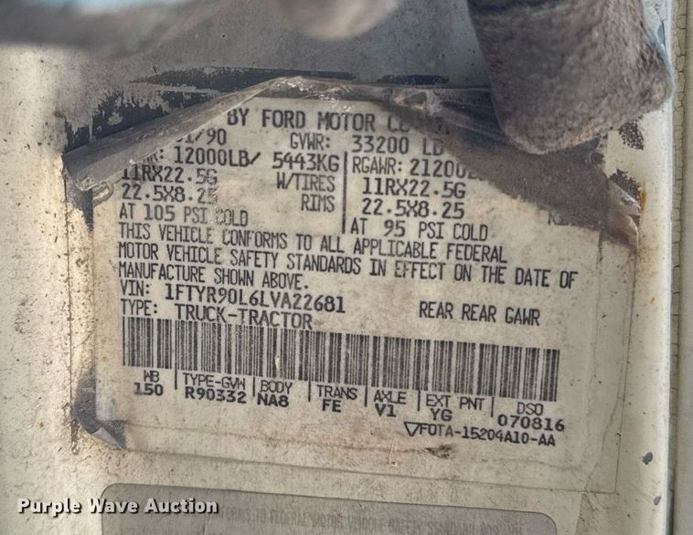 image for item DT0555 1990 Ford L9000 hook lift truck