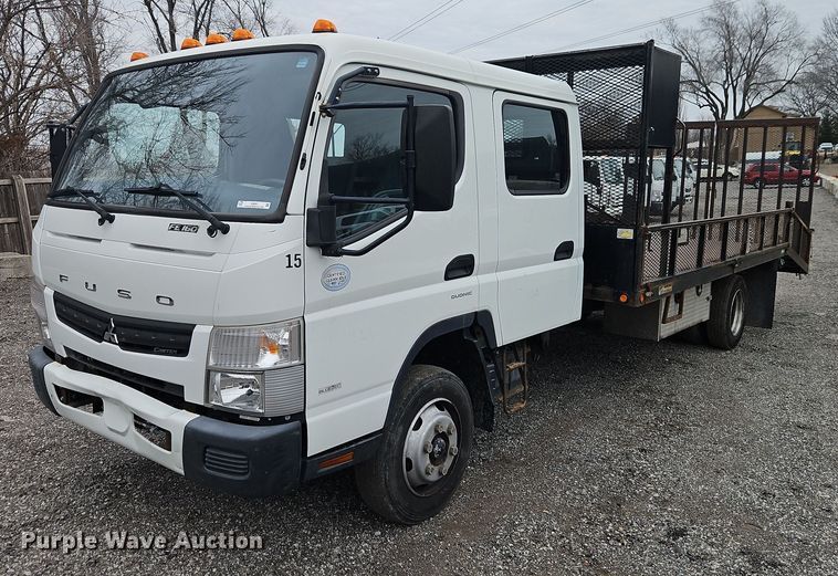 image for item EI8827 2017 Mitsubishi Fuso Canter Crew Cab flatbed truck