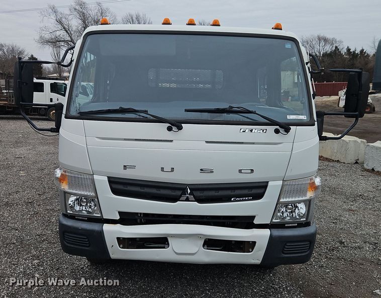 image for item EI8827 2017 Mitsubishi Fuso Canter Crew Cab flatbed truck
