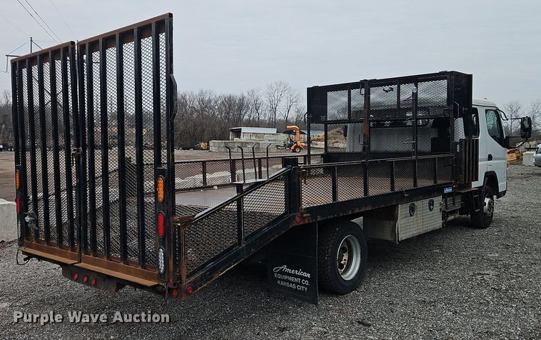 image for item EI8827 2017 Mitsubishi Fuso Canter Crew Cab flatbed truck