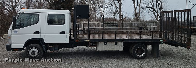 image for item EI8827 2017 Mitsubishi Fuso Canter Crew Cab flatbed truck