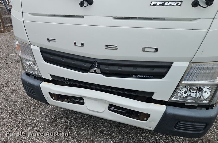 image for item EI8827 2017 Mitsubishi Fuso Canter Crew Cab flatbed truck