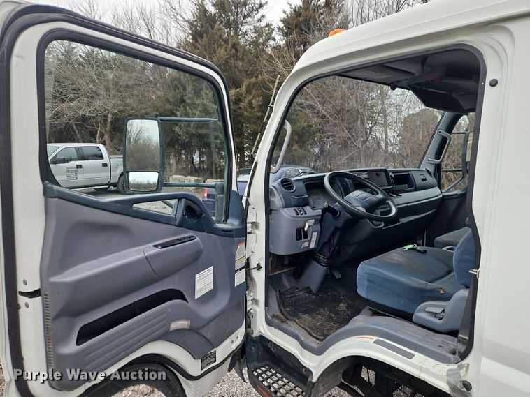 image for item EI8827 2017 Mitsubishi Fuso Canter Crew Cab flatbed truck