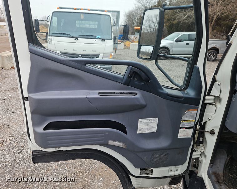 image for item EI8827 2017 Mitsubishi Fuso Canter Crew Cab flatbed truck