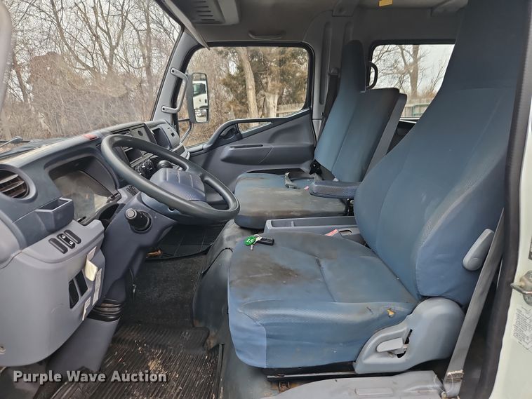 image for item EI8827 2017 Mitsubishi Fuso Canter Crew Cab flatbed truck