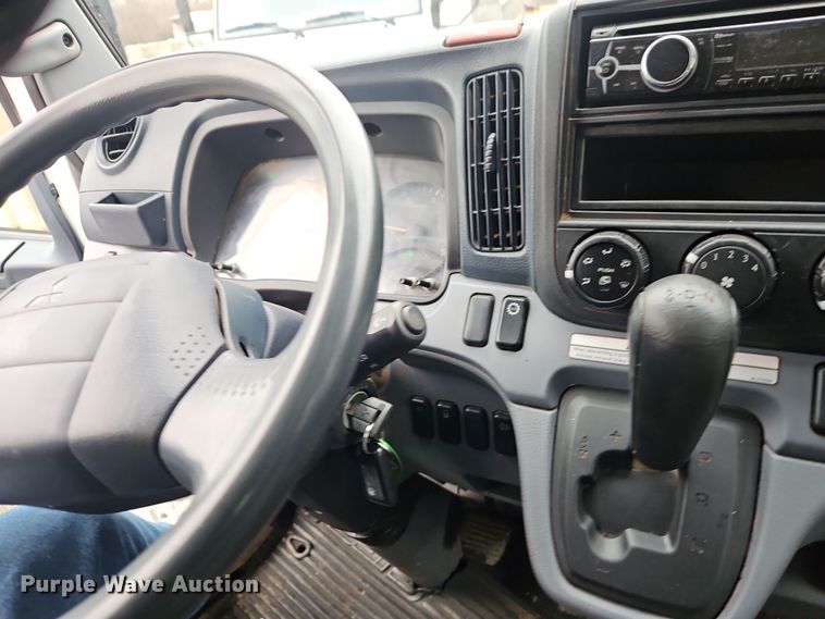 image for item EI8827 2017 Mitsubishi Fuso Canter Crew Cab flatbed truck