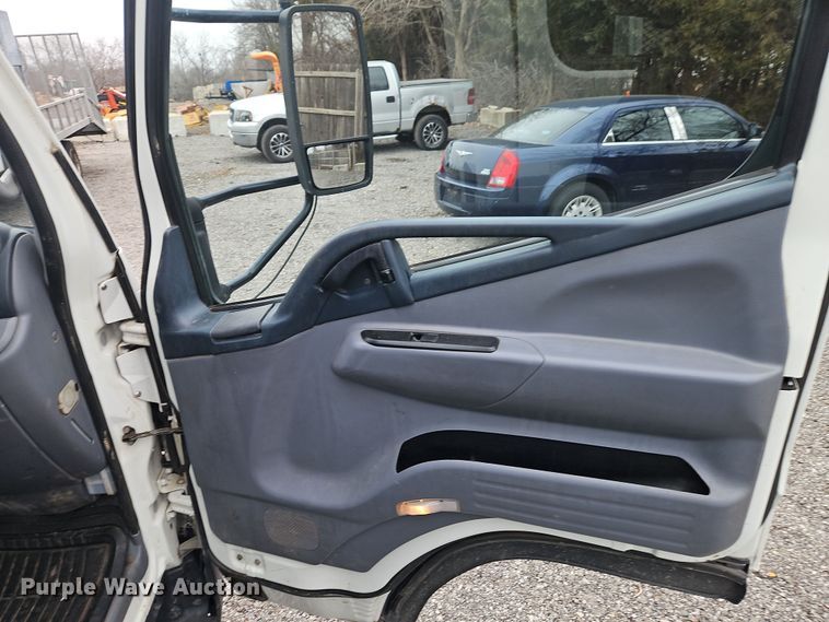 image for item EI8827 2017 Mitsubishi Fuso Canter Crew Cab flatbed truck