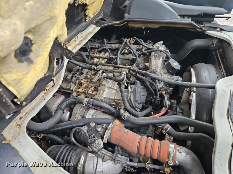 image for item EI8827 2017 Mitsubishi Fuso Canter Crew Cab flatbed truck