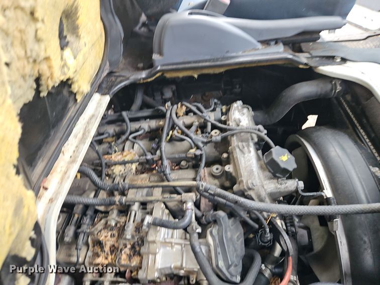 image for item EI8827 2017 Mitsubishi Fuso Canter Crew Cab flatbed truck