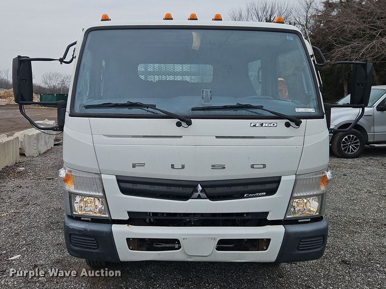 image for item EI8828 2017 Mitsubishi Fuso Canter FE160 Crew Cab flatbed truck
