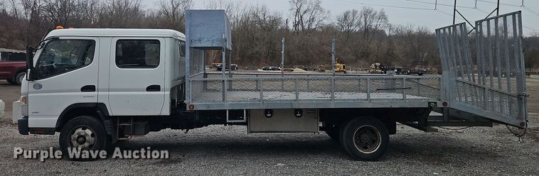 image for item EI8828 2017 Mitsubishi Fuso Canter FE160 Crew Cab flatbed truck
