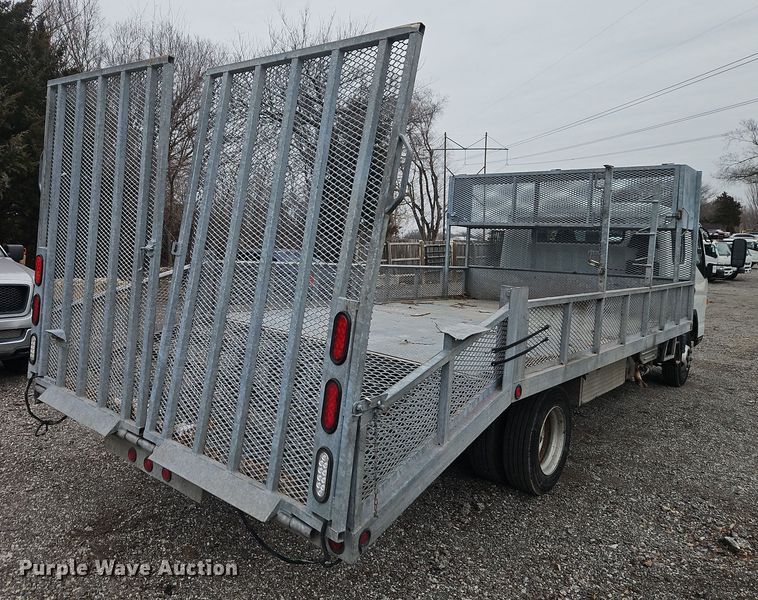 image for item EI8828 2017 Mitsubishi Fuso Canter FE160 Crew Cab flatbed truck