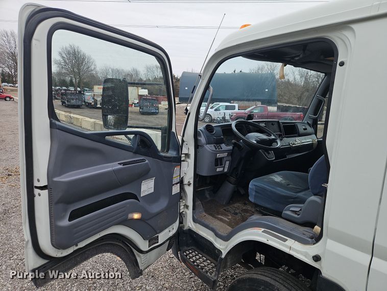 image for item EI8828 2017 Mitsubishi Fuso Canter FE160 Crew Cab flatbed truck